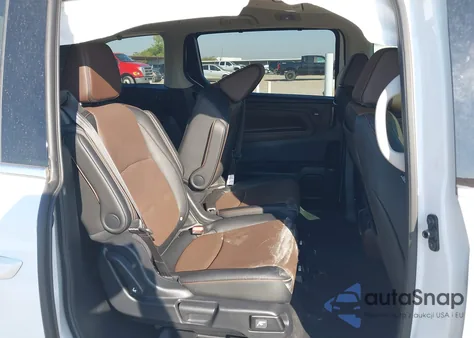 2025 Honda Odyssey Elite z USA, uszkodzony, nr VIN 5FNRL6H91SB049345